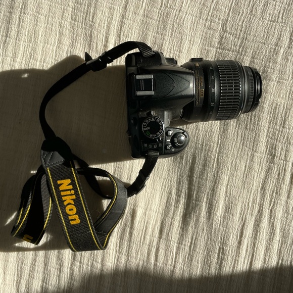 Nikon D3100 with camera bag, charger, lens, and tripod - Picture 3 of 9
